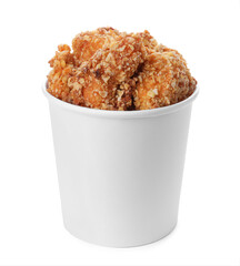 Bucket with yummy fried nuggets isolated on white