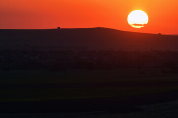Sunset Over Countryside in Summer