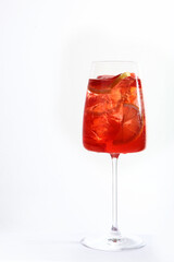 Strawberry and orange lemonade. Soft drink. Summer season. An isolated object. Copy of the space.Vertical photo