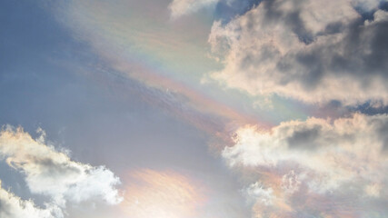 Fototapeta na wymiar abstract background of the evening sky, Beautiful clouds in bright colors as if drawing a rainbow.