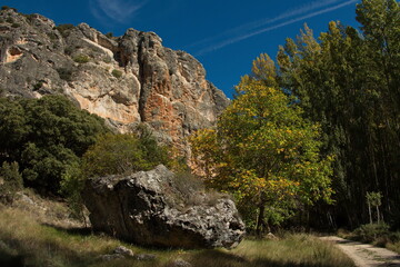 Rock formation at the hiking track from Aragosa to La Cabrera in park Barranco del Rio Dulce, Guadalajara, Spain
