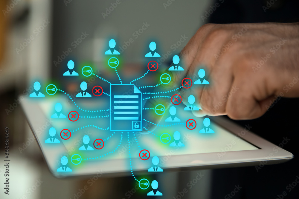 Aufkleber access to documents. man using tablet, closeup. scheme over device