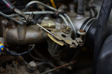 Obraz premium The engine room of the car has a power supply. Air conditioner distributor