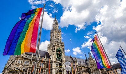 rainbow flags at the munich town hall - obrazy, fototapety, plakaty