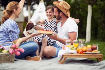 Family enjoying summer together at backyard.