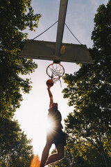 basketball player dunking