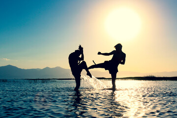 aikido, binary, brave, compatible together, crazy, crazy people, dynamic, dynamism, energetic, exuberant, far east, fearless, funny people, games, healthy, karate, kick, lake, muay tha, muay thai figh