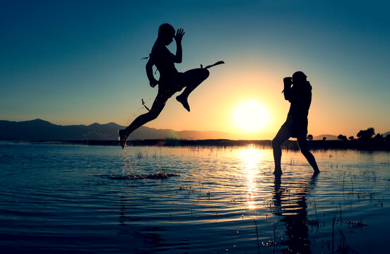 aikido, binary, brave, compatible together, crazy, crazy people, dynamic, dynamism, energetic, exuberant, far east, fearless, funny people, games, healthy, karate, kick, lake, muay tha, muay thai figh