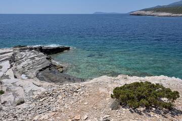 Fototapeta na wymiar RUGGED SCENERY AND WILD BEACHES ON THE ISLAND OF VIS IN CROATIA. ADRIATIC SEA COASTLINE
