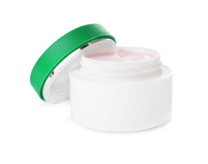 Jar with natural pomegranate facial mask isolated on white