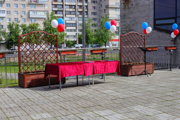 The terrace of the house is decorated with colorful balloons
