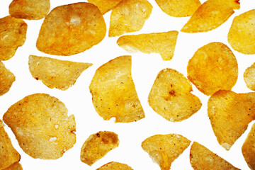 Close-up of potato chips heap on white background