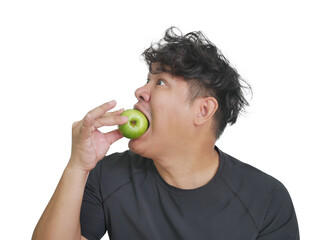 isolate white background fat man asian guy try to started diet with an green apple