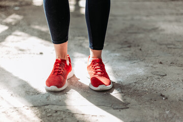 Fototapeta na wymiar Close-up of red pair of female fitness sneakers.