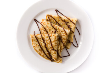 Sweet crepes with chocolate isolated on white background. Top view