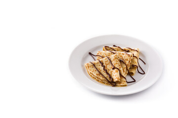 Sweet crepes with chocolate isolated on white background. Copy space