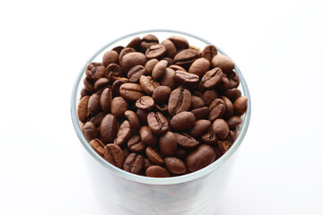 Coffee beans in a glass on the table