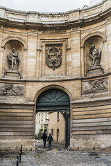 Fountain of the four seasons (Fontaine des Quatre-Saisons, 1745) - monumental public fountain at Grenelle Street, Paris, France. It was executed by Edme Bouchardon, royal sculptor of King Louis XV.