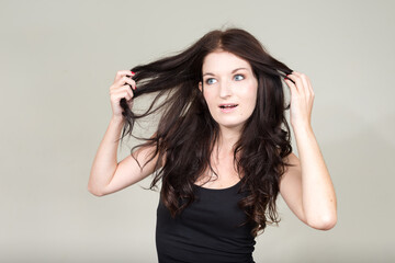 Portrait of young beautiful woman with brown hair