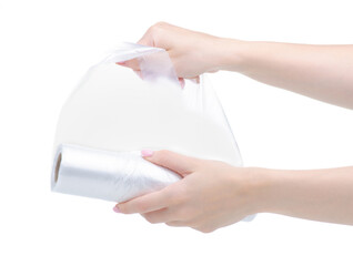 Roll of disposable bags in hand on white background isolation