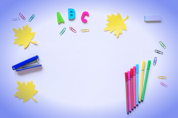 Back to school school supplies on a white background top view