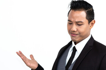 Close up portrait young man thinking,  worried and looking at camera. Black lives matter concept. Handsome man is posing on copy space. Black and white photo in studio.