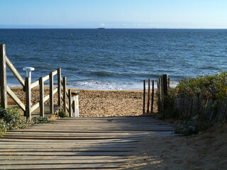 Fototapeta premium A wooden path to Pornichet beach in the Loire-Atlantique, France.
