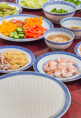 Rice paper and ingredients for making traditional vietnamese spring rolls