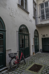 Backyard Of An Historic House With A Locked Vintage Bicycle In The Inner City Of Vienna In Austria