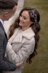 beautiful couple, bride and groom in long dress, part, wedding, girl with curvy hair