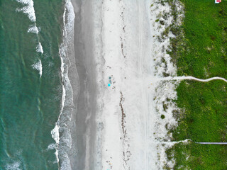 aerial shot of the beach and ocean