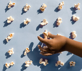 Popcorn arranged neatly on a colorful background
Conceptual of obsessive compulsive disorder. Pop art style