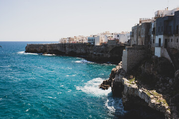 Fototapeta na wymiar View of Polignano a mare, picturesque little town on cliffs of the Adriatic Sea. Apulia, Southern Italy.