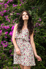 Portrait of young beautiful woman at the park outdoors