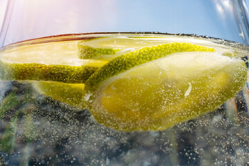 Homemade lime water in glass carafe