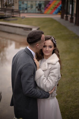 beautiful couple, bride and groom in long dress, part, wedding, girl with curvy hair