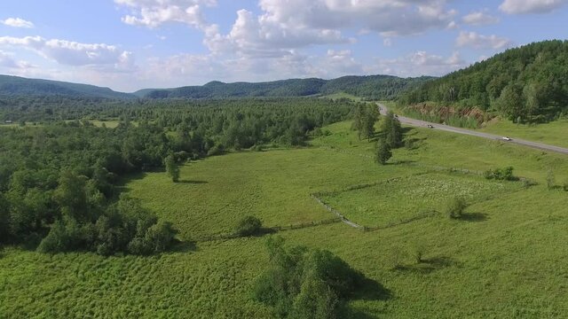 Flying in the mountains on a drone sss view of the Ural mountains.