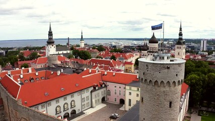 Estonian flag in the wind over the old city of Tallinn.