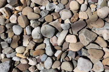 Stones in dappled sunlight