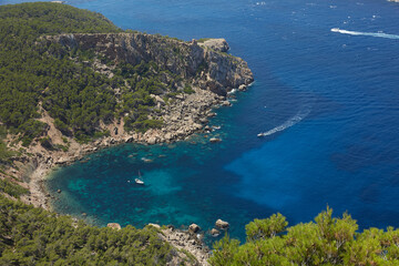 Panoramic of Torre de Cala en Basset and Cala en Basset taken from La Trapa, an old monastery located in San Telmo, a small town that is part of the Spanish municipality of Andrach, in Mallorca, Spain