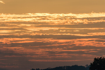 Fototapeta na wymiar Amazing sunrise cloudscape copy space