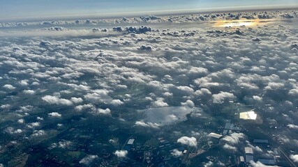 aerial view of the clouds and sunshine in the horizon. Natural phenomenon colours