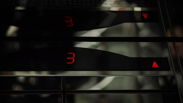 Digital scoreboard showing floor number.Digital Display in the Elevator with Arrow Up Shows Floors from 1st to 17th. Lift going up. Cabin of modern passenger elevator.