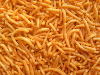 Orange color Sev Indian fried snack