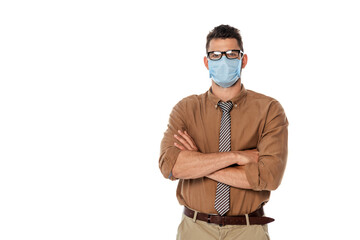 Teacher in medical mask with crossed arms looking at camera isolated on white