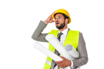 Shocked engineer in suit holding blueprints and looking away isolated on white