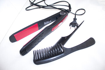 Hair iron tool hairdressing on white background