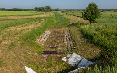 Ecological problems, global warming. Drought. Dry irrigation canal without water. Disaster, crop...