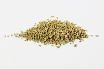 Organic Heap of dried thyme  seeds on a white background.