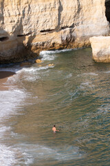 Algarve, Lisbon. Beautiful bay near Lagos town with high cliffs on the shore of the Atlantic Ocean. The Algarve is the southernmost region of continental Portugal. 